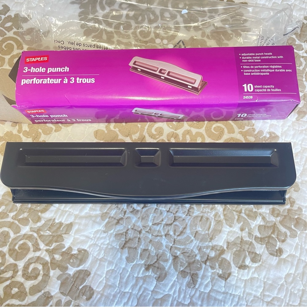 STAPLES 3 hole punch, new without tags
